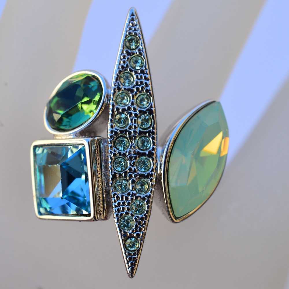 Silver ring with green Swarovski stones